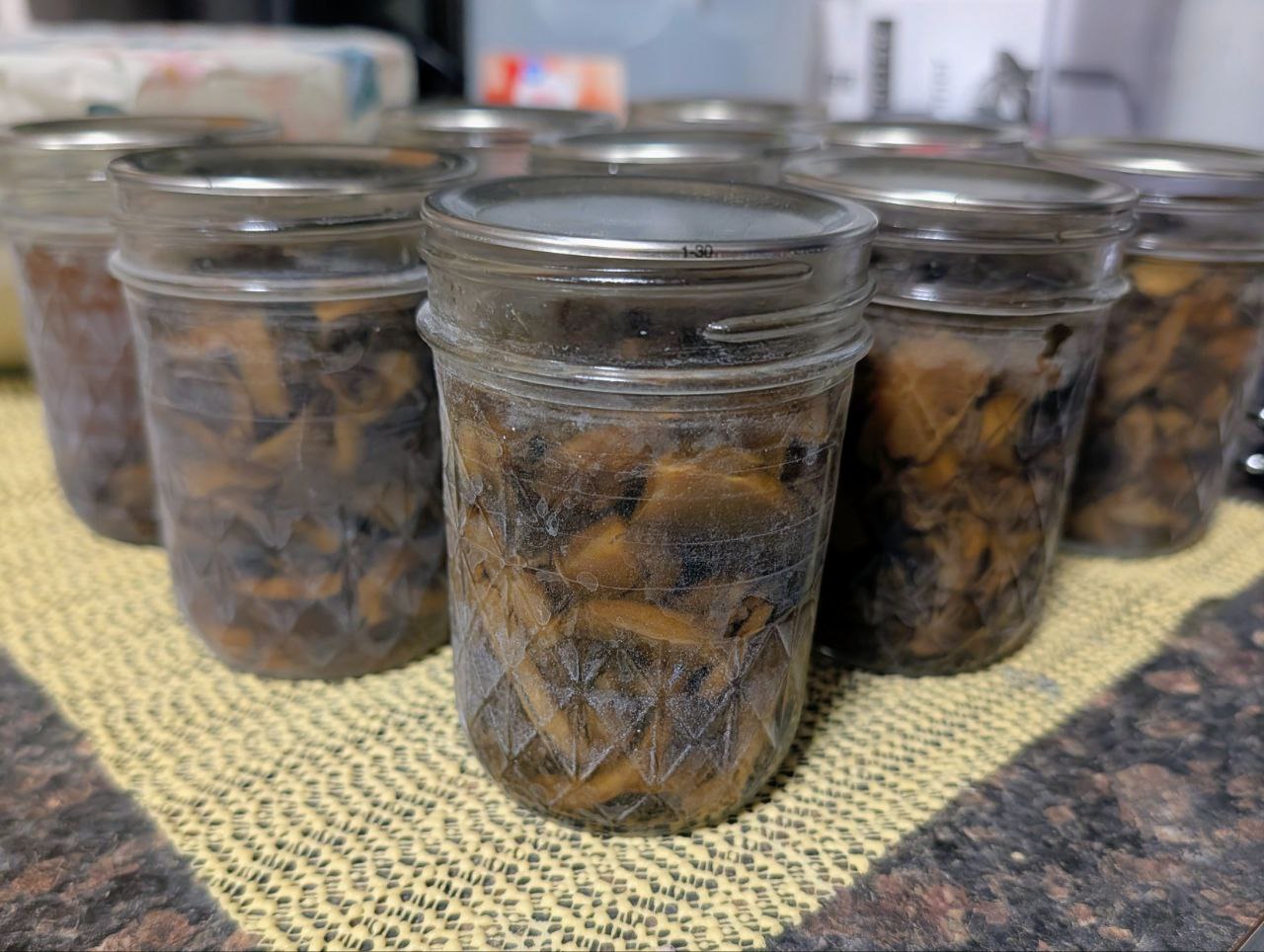half pint jars of home canned mushrooms